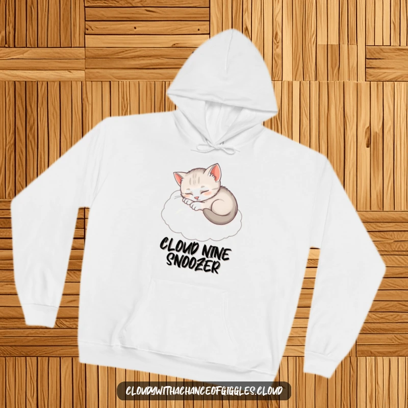 Funny Sleepy Kitten Hoodie: A content kitten fast asleep on a plush cloud, designed for ultimate coziness.