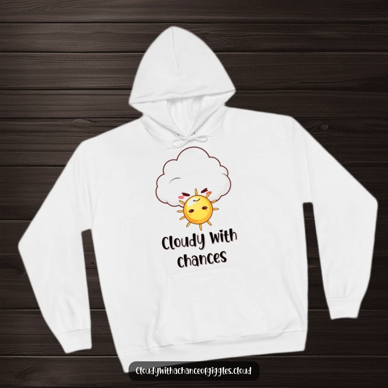 Funny hoodie depicting a mischievous cloud with a sly grin, playfully peeking from behind a tiny sun, offering warmth and a dose of adorable humor.