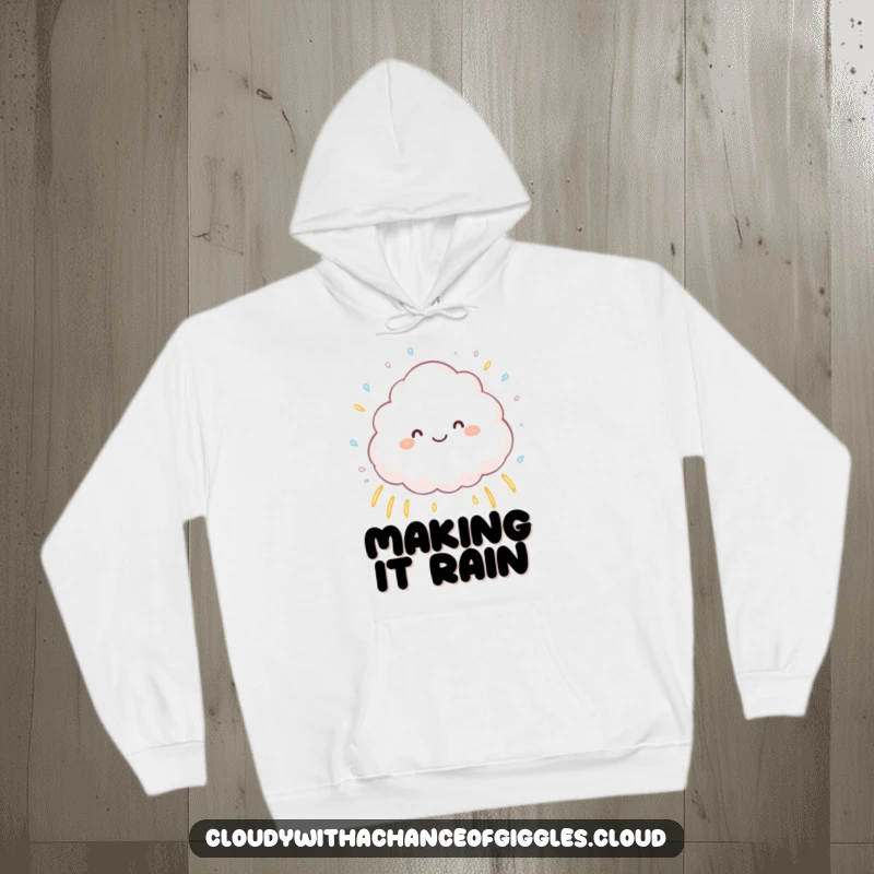 Funny fluffy cloud character sprinkling tiny raindrops that create small rainbows, a cozy and humorous hoodie for embracing a cheerful demeanor.