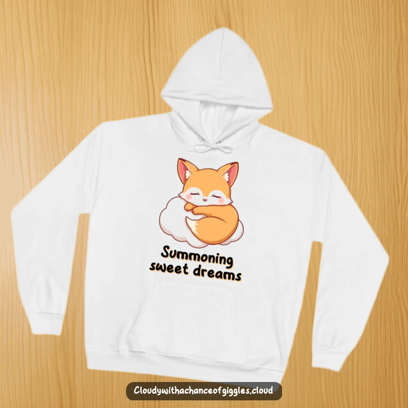 Funny sleepy fox curled up smiling on a soft cloud with closed eyes, a cozy and humorous hoodie for ultimate relaxation.