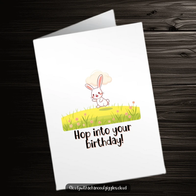 Funny Free Printable Birthday Card: A joyful rabbit hopping happily through a field under a smiling cloud.