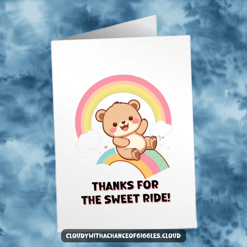 Funny Free Printable Thank You Card: A playful bear cub slides down a rainbow with a huge grin, offering colorful thanks.