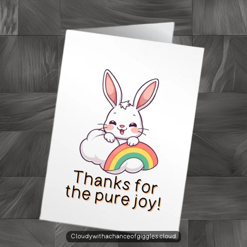Funny free printable thank you card with a happy bunny holding a rainbow from behind a cloud.