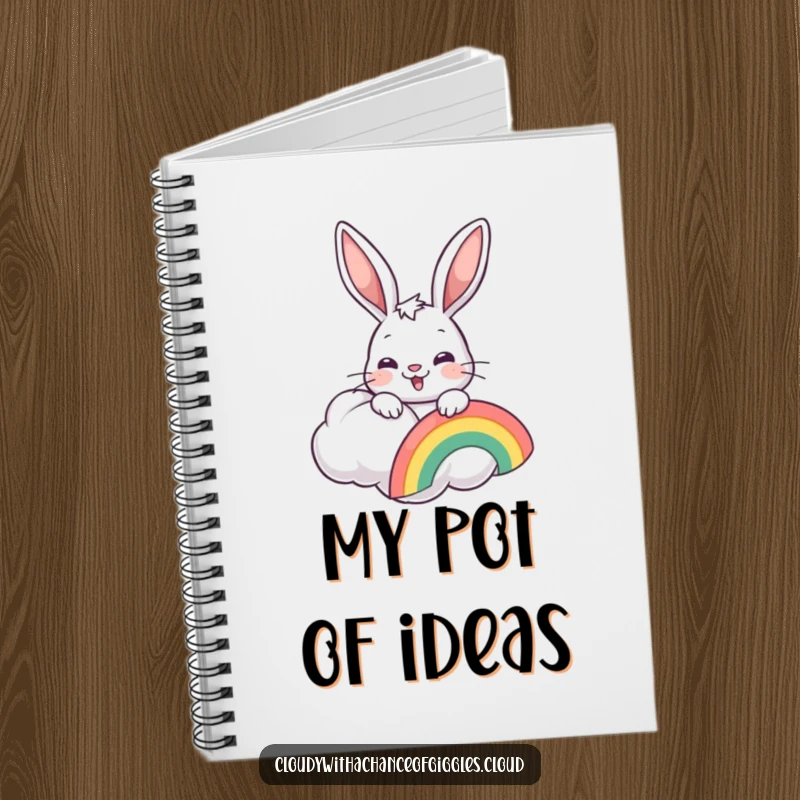 Funny cheerful bunny with a rainbow, peeking from a cloud, on a stylish notebook cover.