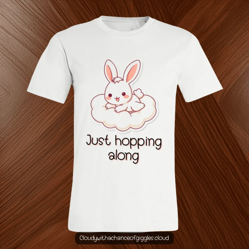 Funny bunny t-shirt showing a playful bunny with a cheerful expression sliding down a fluffy cloud, embodying pure joy and cuteness.