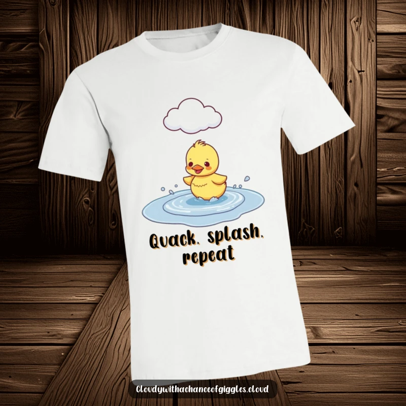 Funny Duckling Puddle Splash T-Shirt, depicting a happy duckling joyfully splashing in a puddle under a cloud, full of fun.