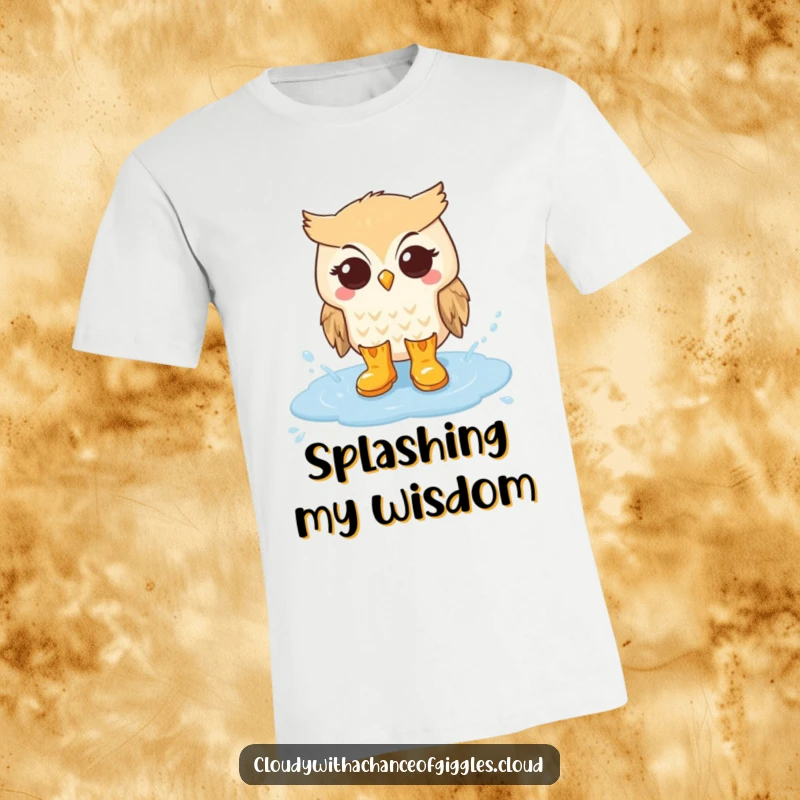 Funny t-shirt depicting a charming owl in tiny rain boots splashing gleefully in a soft cloud puddle.
