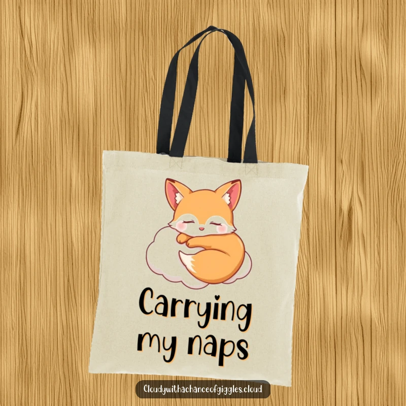 Funny sleepy fox curled up smiling on a soft cloud with closed eyes, a humorous and practical tote bag for everyday use.