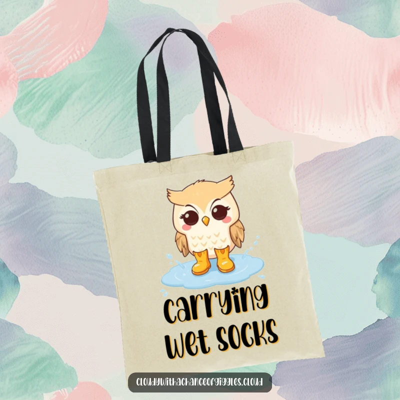 Funny tote bag showing a cute owl in rain boots splashing in a cloud puddle, perfect for carrying items on wet days.