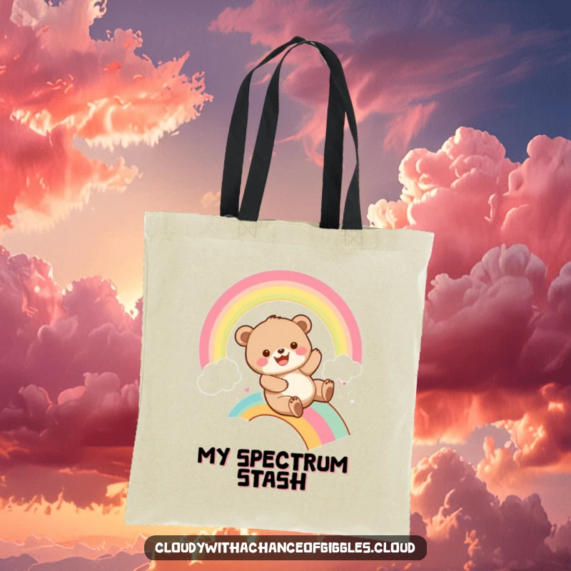 Funny bear cub sliding down a vibrant rainbow with a big grin, on a tote bag, perfect for carrying essentials with playful energy.