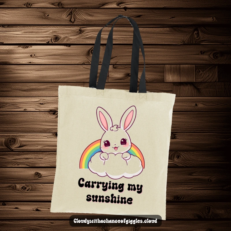 Funny tote bag with a cheerful bunny peeking from behind a puffy cloud, holding a rainbow, perfect for daily use.